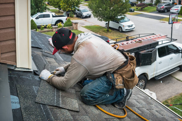 Professional Roofing technician working in Wamego, KS